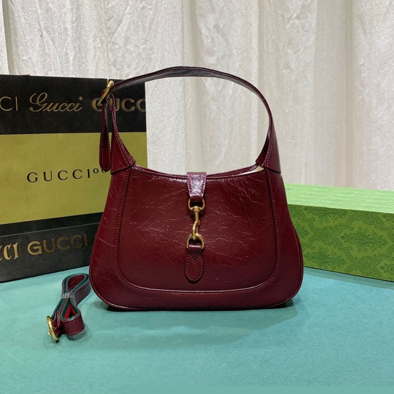 G*u*i top handle bags